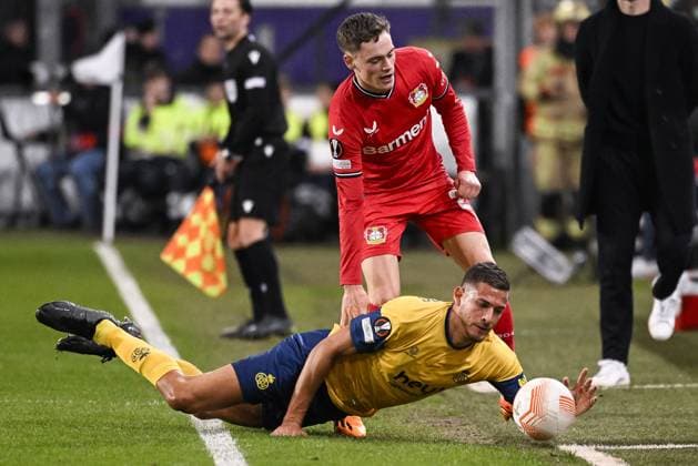 Union s Ismael Kandouss and Leverkusen s Florian Wirtz fight for the ball during a soccer match between Belgian Royale Union Saint-Gilloise and German Bayer 04 Leverkusen, Thursday 20 April 2023 in Anderlecht, Brussels, the return leg of the quarterfinals of the UEFA Europa League competition. The first leg ended in a 1-1 draw. LAURIExDIEFFEMBACQ  x65502658x