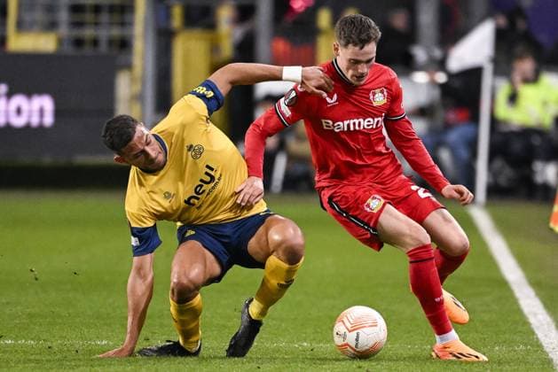 Union s Ismael Kandouss and Leverkusen s Florian Wirtz fight for the ball during a soccer match between Belgian Royale Union Saint-Gilloise and German Bayer 04 Leverkusen, Thursday 20 April 2023 in Anderlecht, Brussels, the return leg of the quarterfinals of the UEFA Europa League competition. The first leg ended in a 1-1 draw. LAURIExDIEFFEMBACQ  x65502715x