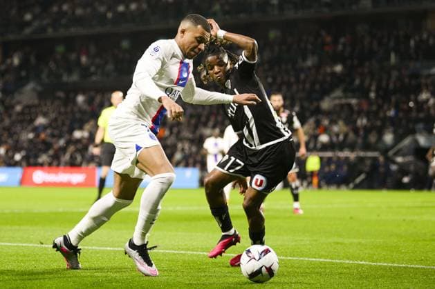 Kylian Mbappe (PSG) vs Ibrahim Amadou (Angers) FOOTBALL : Angers vs PSG - Ligue1 - 21 04 2023 JBAutissier Panoramic 