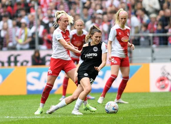 23 04 2023, Cologne, Germany, Rhein Energie Stadium, 1 FC Koeln vs Eintracht Frankfurt Frauen Bundesliga, Mandy Islacker 1 FC Koeln and Barbara Dunst Eintracht Frankfurt in duel Foto Ralf Treese, Ralf Treese DFB DFL REGULATIONS PROHIBIT ANY USE OF PHOTOGRAPHS AS IMAGE SEQUENCES AND OR QUASI VIDEO Cologne Rhein Energie Stadium North Rhine Westphalia Germany  521_KOESGE20230423_017 Treese-521