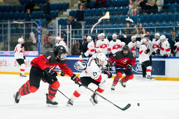 27 04 2023, Basel, St Jakob Arena, IIHF Ice Hockey U18 World Championship Canada vs Switzerland, 27 Simon Meier Switzerland against 6 Andrew Gibson Canada Basel St Jakob Arena Basel Switzerland  Copyright: xJustPictures.ch DanielaxPorcellix