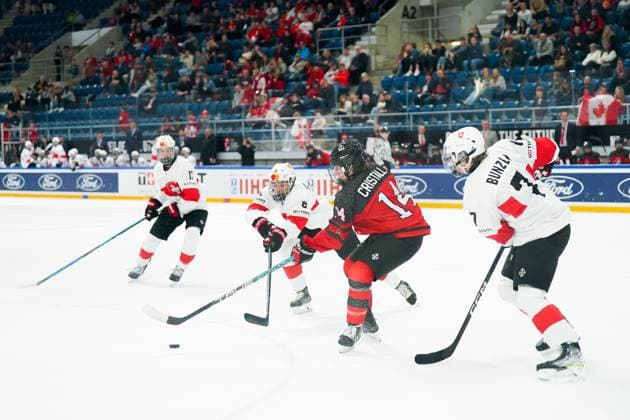 27 04 2023, Basel, St Jakob Arena, IIHF Ice Hockey U18 World Championship Canada vs Switzerland, 8 Rico Gredig Switzerland against 14 Andrew Cristall Canada Basel St Jakob Arena Basel Switzerland  Copyright: xJustPictures.ch DanielaxPorcellix