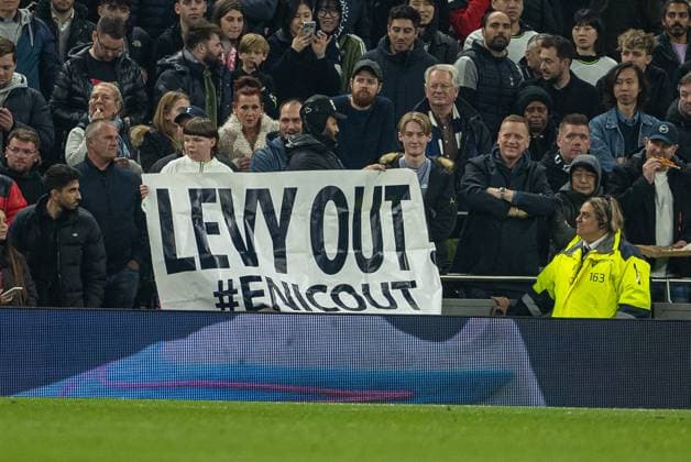 Football - FA Premier League - Tottenham Hotspur FC v Manchester United, ManU FC LONDON, ENGLAND - Thursday, April 27, 2023: Tottenham Hotspur supporters with a Levy Out banner, calling for the removal of club Chairman Daniel Levy, during the FA Premier League match between Tottenham Hotspur FC and Manchester United FC at the Tottenham Hotspur Stadium. LONDON Tottenham Hotspur Stadium GREATER LONDON ENGLAND  Copyright: xDavidxRawcliffex P2023-04-27-Tottenham_Man_Utd-26