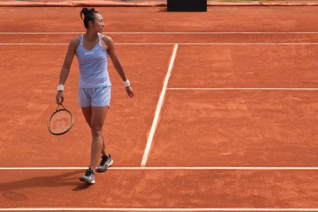 (230428) -- MADRID, April 28, 2023 -- Zheng Qinwen of China looks on during the women s singles round of 64 match against Caty McNally of the United States at the Madrid Open tennis tournament in Madrid, Spain, April 28, 2023. ) (SP)SPAIN-MADRID-TENNIS-MADRID OPEN-WOMEN S SINGLES MengxDingbo 