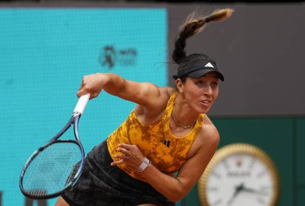 Jessica Pegula serves a shot to Magdalena Frech of Poland during their second round match on day five of the Mutua Madrid Open at the Caja Magica stadium, in Madrid, Spain, on Friday, April 28, 2023.  PDH20230428050 PaulxHanna