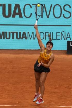 Jessica Pegula serves a shot to Magdalena Frech of Poland during their second round match on day five of the Mutua Madrid Open at the Caja Magica stadium, in Madrid, Spain, on Friday, April 28, 2023.  PDH20230428051 PaulxHanna