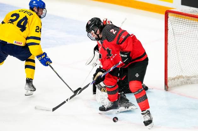 BASEL, SWITZERLAND APRIL 29 Lukas Dragicevic of Canada save this puck during the semi final of U18 Ice Hockey World Championship match between Sweden and Canada at St Jakob Park on April 29, 2023 in Basel, Switzerland Basel St Jakob Park Basel Stadt Switzerland  Copyright: xJustPictures.ch JarixPestelaccix