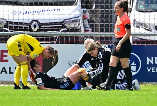 30 04 2023 football women season 2022 2023 2 Bundesliga 22 matchday 1 FC Nürnberg FCN club SG Andernach Sportfoto Zink regulations prohibit any use of photographs as image sequences and or quasi video xwoxzix Lara Felix 13, 1 FC Nürnberg FCN battered on the ground injured injury