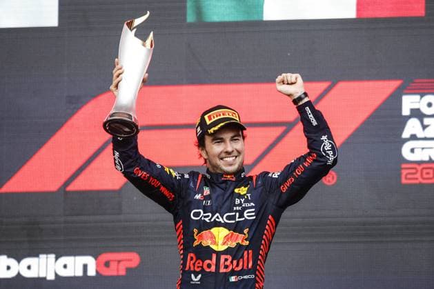 PEREZ Sergio (mex), Red Bull Racing RB19, portrait celebrates his victory, win at the podium during the Formula 1 Azerbaijan Grand Prix 2023, 4th round of the 2023 Formula One World Championship, WM, Weltmeisterschaft from April 28 to 30, 2023 on the Baku City Circuit, in Baku, Azerbaijan - F1 - AZERBAIJAN GRAND PRIX 2023 - RACE DPPI Panoramic  03323006__R3_3139