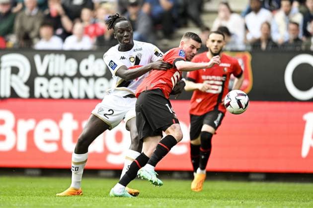 Benjamin Bourigeaud (Rennes FC) vs Batista Mendy (Angers) FOOTBALL : Rennes vs Angers - Ligue 1 - 30 04 2023 JBAutissier Panoramic 