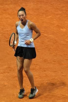 (230501) -- MADRID, May 1, 2023 -- Zheng Qinwen of China celebrates during the women s singles round of 32 match against Ekaterina Alexandrova of Russia at the Madrid Open tennis tournament in Madrid, Spain, April 30, 2023. ) (SP)SPAIN-MADRID-TENNIS-MADRID OPEN-WOMEN S SINGLES MengxDingbo 