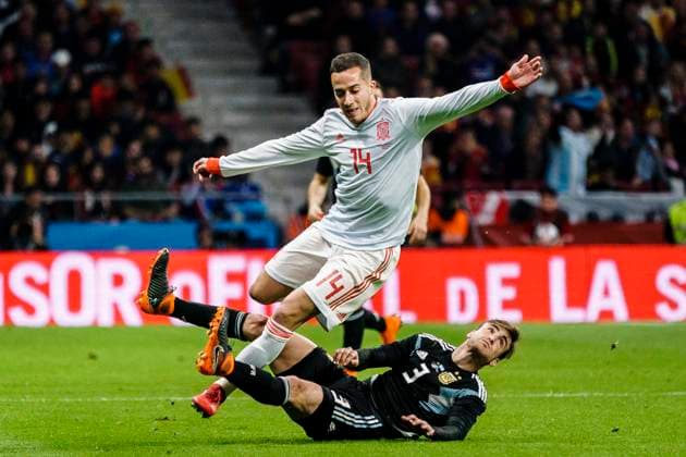 Spain v Argentina - International Friendly, Länderspiel, Nationalmannschaft Nicolas Tagliafico of Argentina (R) trips up with Lucas Vazquez of Spain (L) during the International Friendly 2018 match between Spain and Argentina at Wanda Metropolitano Stadium on 27 March 2018 in Madrid, Spain. Madrid Wanda Metropolitano Spain  Copyright: xPowerxSportxImagesx PSI03201_27MARZO2018_DGS4740