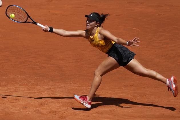 Jessica Pegula of the U.S. returns a shot to Veronika Kudermetova of Russia during their quarter final match on day 8 of the Mutua Madrid Open at the Caja Magica stadium, in Madrid, Spain, on Wednesday, May 3, 2023.  PDH20230503004