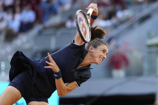 Petra Martic of Croatia serves a shot to Iga Swiatek of Poland during their quarter final match on day 8 of the Mutua Madrid Open at the Caja Magica stadium, in Madrid, Spain, on Wednesday, May 3, 2023.  PDH20230503107 PaulxHanna