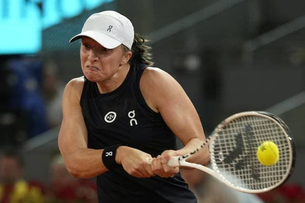 Iga Swiatek of Poland returns a shot to Veronika Kudermetova of Russia during their semi-final match of the Mutua Madrid Open at the Caja Magica stadium, in Madrid, Spain, on Thursday, May 4, 2023.  PDH20230504153 PaulxHanna