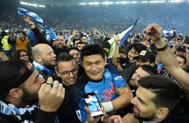 FOOTBALL SERIES A SEASON 2022 2023 33 Matchday Udinese Calcio SSC Napoli 04 05 2023 JOY, SSC Napoli celebrates the third championship in the clubs history player Min Jae Kim center bottom after the pitch storm after the match surrounded by Napoli fans