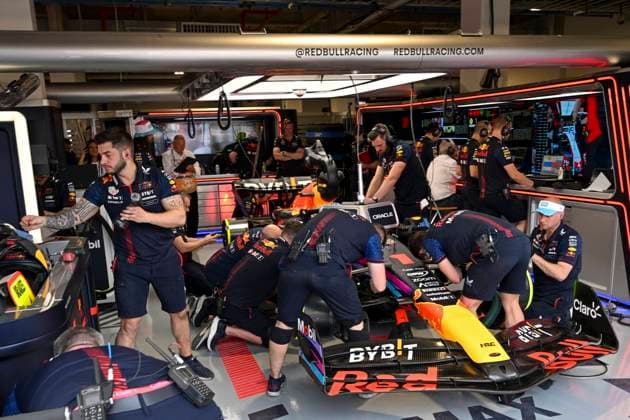 5th May 2023: Miami International Autodrome, Miami Gardens, Florida, USA: Formula 1 Crypto.com Miami Grand Prix 2023: Free Practice Day: Max Verstappen sits in the number 1 Oracle Red Bull Racing car in the garage as his crew works on the car during a practice session.  ActionPlus12505323 DouglasxMurray