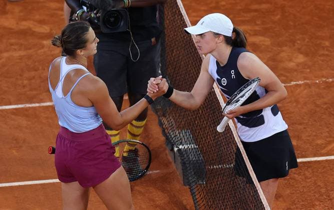 Mandatory Credit: Photo by Ella Ling Shutterstock (13895885d) Aryna Sabalenka of Belarus shakes hands with Iga Swiatek of Poland Mutua Madrid Open, Day 13, Tennis, La Caja Magica, Madrid, Spain - 06 May 2023 Mutua Madrid Open, Day 13, Tennis, La Caja Magica, Madrid, Spain - 06 May 2023 Copyright: xEllaxLing Shutterstockx 13895885d