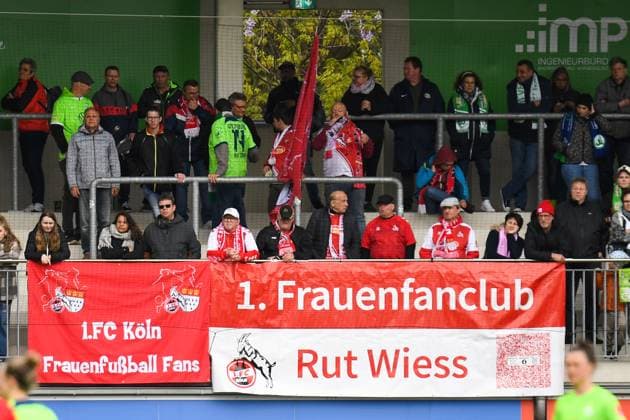 Soccer I Women I Season 2022 2023 I 19 Matchday I VfL Wolfsburg 1 FC Köln I 07 05 2023 Cologne fans with flags and banners at AOK Stadium Wolfsburg AOK Stadium Lower Saxony Germany Copyright: xLobeca InesxHähnelx