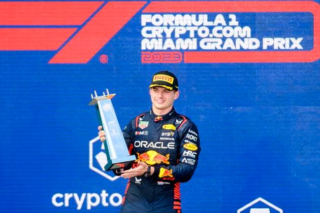 7th May 2023: Miami International Autodrome, Miami Gardens, Florida, USA: Formula 1 Crypto.com Miami Grand Prix 2023: Race Day: Oracle Red Bull Racing driver Max Verstappen celebrates winning the Miami GP as he holds the first place trophy on the podium.  ActionPlus12507206 DouglasxMurray