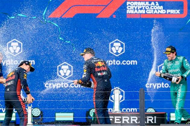 7th May 2023: Miami International Autodrome, Miami Gardens, Florida, USA: Formula 1 Crypto.com Miami Grand Prix 2023: Race Day: From left, Oracle Red Bull Racing driver Sergio Perez, Oracle Red Bull Racing driver Max Verstappen and Aston Martin Aramco Cognizant driver Fernando Alonso spray champagne as they celebrate on the podium.  ActionPlus12507213 DouglasxMurray