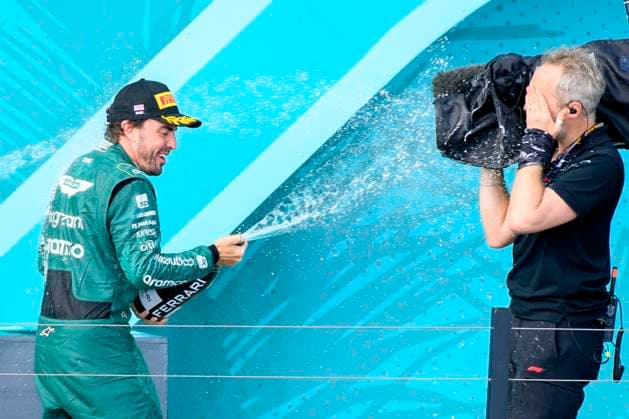 7th May 2023: Miami International Autodrome, Miami Gardens, Florida, USA: Formula 1 Crypto.com Miami Grand Prix 2023: Race Day: Aston Martin Aramco Cognizant driver Fernando Alonso sprays champagne on a cameraman as he celebrates on the podium.  ActionPlus12507216 DouglasxMurray