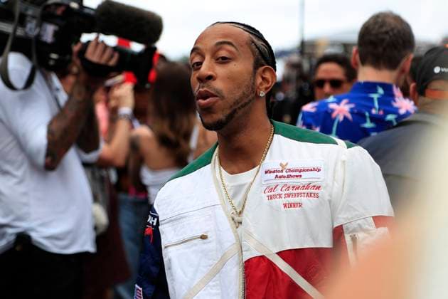MIAMI GARDENS, FL - MAY 07: Ludacris walks on the grid prior to the running of the Formula 1 Crypto.com Miami Grand Prix at Miami International Autodrome in Miami Gardens, FL. (Photo by Jeff Robinson Icon Sportswire) AUTO: MAY 07 F1 Crypto.com Miami Grand Prix EDITORIAL USE ONLY Icon23050731081
