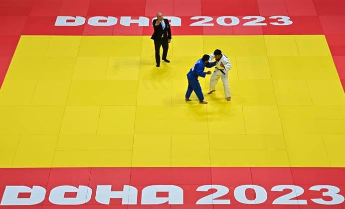 Sport Themen der Woche KW19 World Judo Championships Doha 2023 Postigos Juan (in blue) of Peru and Kyrgyzbayev Gusman of Kazakhstan fight in the men s -66Kg category 1st round of the World Judo Championships Doha 2023 in Doha, Qatar, 08 May 2023. DOHA Qatar  Copyright: xNoushadxThekkayilx originalFilename:varittyakkal-worldjud230508_np4rg.jpg