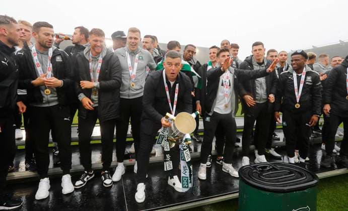 Plymouth Argyle promotion celebrations, Plymouth, UK 8 May 2023 Steven Schumacher manager of Plymouth Argyle lifts the trophy duringPlymouth Argyle promotion celebrations on 8th May 2023 at Home Park, Plymouth, Devon - Plymouth Home Park Devon England Copyright: xDavexRowntree PPAUKx PPA-030067