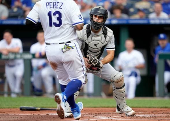 MAY 10, 2023: Chicago White Sox catcher Seby Zavala (44) waits at the plate to tag Kansas City Royals catcher Salvador Perez (13) in the first inning at Kauffman Stadium Kansas City, Missouri. CSM. Kansas City United States - ZUMAc04_ 20230510_zaf_c04_061 Copyright: xJonxRobichaudx