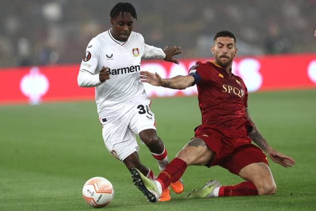 Rome, Italy 11.05.2023: Jeremie Frimpong of Leverkusen, Lorenzo Pellegrini of Roma in action during the UEFA EUROPA LEAGUE 2022 2023, semifinal football match AS Roma vs Bayer 04 Leverkusen at Olympic stadium in Rome, Italy.  Copyright: xmarcoxiacobuccix xipa-agency.netx xmarcoxiacobuccix 0 IPA_IPA37876775