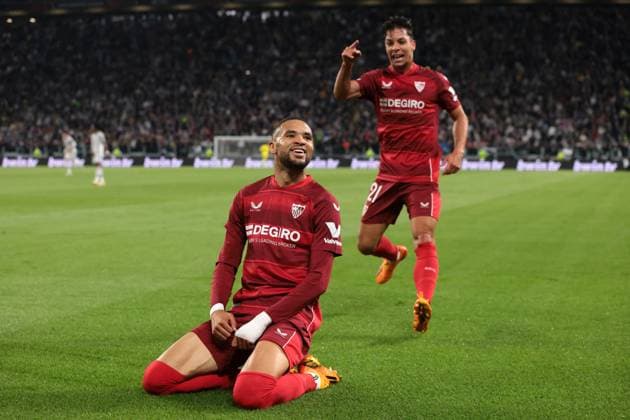 Turin, Italy, 11th May 2023. Youssef En-Nesyri of Sevilla celebrates with team mates after scoring to give the side a 1-0 lead during the UEFA Europa League match at Allianz Stadium, Turin. Picture credit should read: Jonathan Moscrop Sportimage EDITORIAL USE ONLY. No use with unauthorised audio, video, data, fixture lists, club league logos or live services. Online in-match use limited to 120 images, no video emulation. No use in betting, games or single club league player publications. SPI-2435-0015