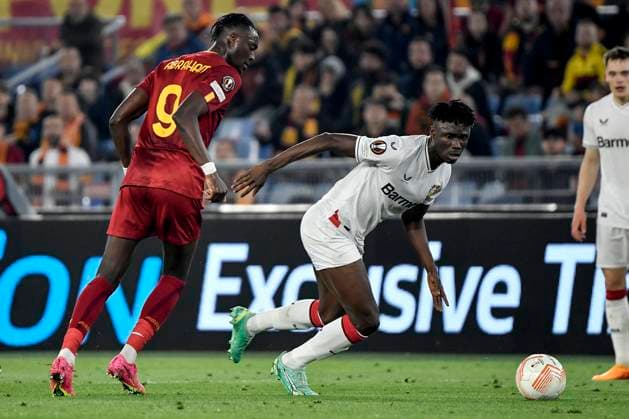 Tammy Abraham of AS Roma and Odilon Kossounou of Bayer Leverkusen during the Europa League football match between AS Roma and Bayer Leverkusen at Olimpico stadium in Rome (Italy), May 11th, 2023. andreaxstaccioli
