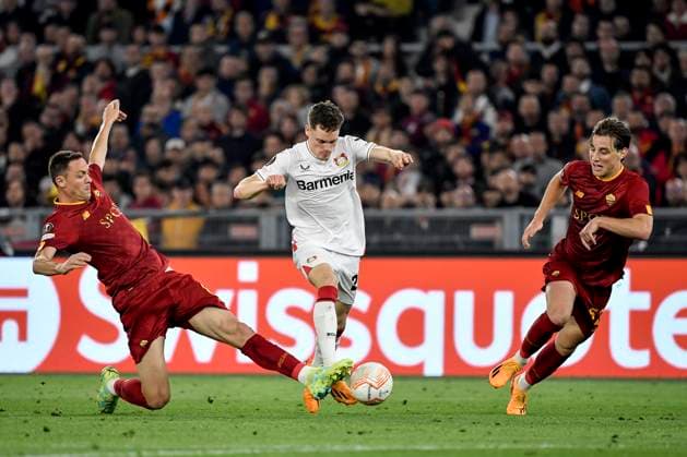 Nemanja Matic of AS Roma, Florian Wirtz of Bayer Leverkusen and Edoardo Bove of AS Roma during the Europa League football match between AS Roma and Bayer Leverkusen at Olimpico stadium in Rome (Italy), May 11th, 2023. andreaxstaccioli