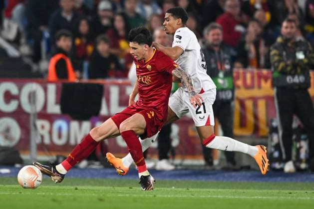 AS RomaÃ¢& x80;& x99;s Roger IbaoÂ±ez defending ball from Bayer LeverkusenÃ¢& x80;& x99;s Amine Adli during semifinal Europe League soccer match between AS Roma vs. Bayern Leverkusen at the Olimpico stadium in Rome, Italy, 11th of May 2023  Copyright: xVinnyxOrlando LiveMediax xipa-agx xLivexMediax 0 IPA_IPA37878289