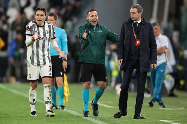 Turin, Italy, 11th May 2023. Juventus team manager Matteo Fabris is ushered away by the Fourth Official Orel Grinfeeld of Israal as Federico Chiesa of Juventus reacts following a strong challenge on Adrien Rabiot of Juventus in the penalty area during the UEFA Europa League match at Allianz Stadium, Turin. Picture credit should read: Jonathan Moscrop Sportimage EDITORIAL USE ONLY. No use with unauthorised audio, video, data, fixture lists, club league logos or live services. Online in-match use limited to 120 images, no video emulation. No use in betting, games or single club league player publications. SPI-2435-0102