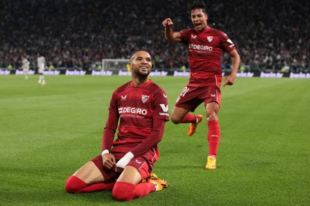 Turin, Italy, 11th May 2023. Youssef En-Nesyri of Sevilla celebrates with team mate after scoring to give the side a 1-0 lead during the UEFA Europa League match at Allianz Stadium, Turin. Picture credit should read: Jonathan Moscrop Sportimage EDITORIAL USE ONLY. No use with unauthorised audio, video, data, fixture lists, club league logos or live services. Online in-match use limited to 120 images, no video emulation. No use in betting, games or single club league player publications. SPI-2435-0105
