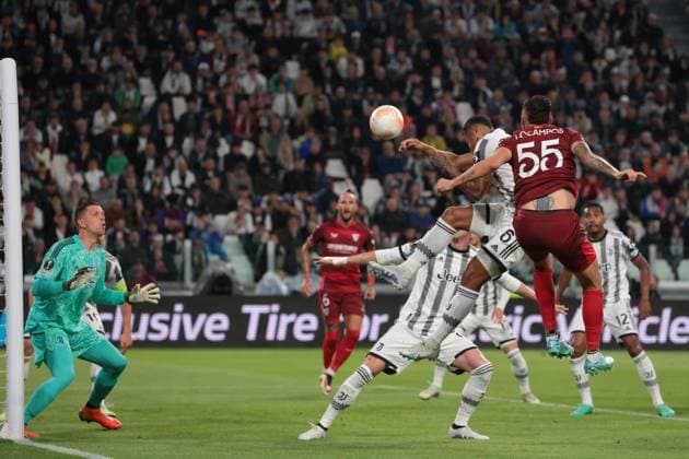 Turin, Italy, 11th May 2023. Wojciech Szczesny of Juventus looks on as team mate Danilo heads the ball clear from Lucas Campos of Sevilla during the UEFA Europa League match at Allianz Stadium, Turin. Picture credit should read: Jonathan Moscrop Sportimage EDITORIAL USE ONLY. No use with unauthorised audio, video, data, fixture lists, club league logos or live services. Online in-match use limited to 120 images, no video emulation. No use in betting, games or single club league player publications. SPI-2435-0115
