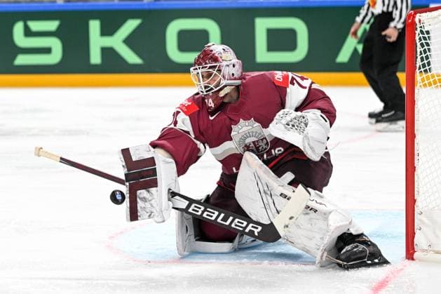 RIGA, LATVIA MAY 12 goalkeeper Ivars Punnenovs of Latvia stops the puck during the 2023 IIHF Ice Hockey World Championship Finland Latvia game between Latvia and Canada at Arena Riga on May 12, 2023 in Riga, Latvia Riga Arena Riga Latvia  Copyright: xJustPictures.ch AndreaxBrancax