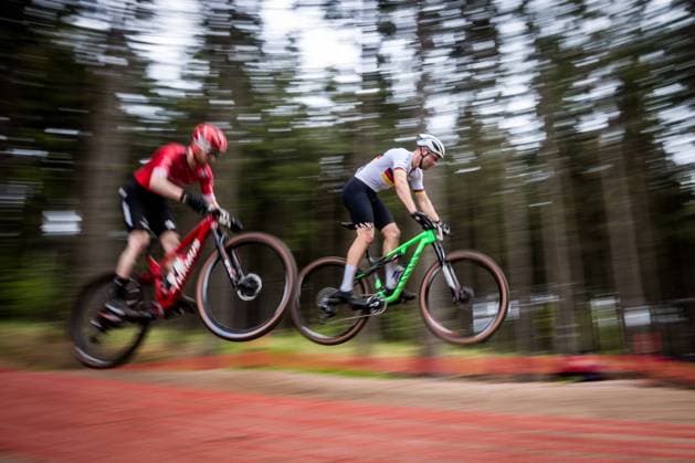 Luca Schwarzbauer from Germany, right, competes in the Men ELITE cross-country short track race within the UCI Mountain Bike World Cup, on May 12, 2023, in Nove Mesto na Morave, Czech Republic. (CTKxPhoto JaroslavxSvoboda) CTKPhotoP2023051208935  CTKPhotoP2023051208935