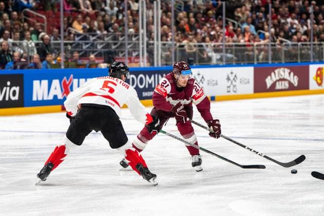 RIGA, LATVIA MAY 12 Rudolfs Balcers of Latvia R against Jacob Middleton of Canada L during the 2023 IIHF Ice Hockey World Championship Finland Latvia game between Latvia and Canada at Arena Riga on May 12, 2023 in Riga, Latvia Riga Arena Riga Latvia  Copyright: xJustPictures.ch JarixPestelaccix