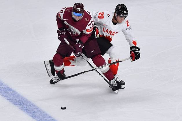 LATVIA, RIGA - 12.05.23: INDRASIS Miks, BARRON Justin. Game Latvia - Canada. IIHF 2023 Ice hockey, Eishockey World Championship, WM, Weltmeisterschaft  Copyright: xVITALIIxKLIUIEVx