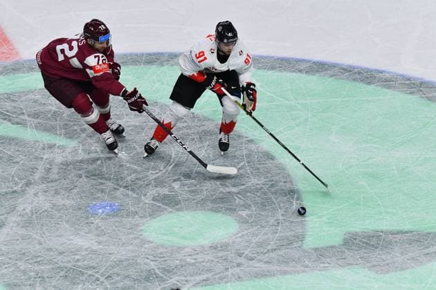 LATVIA, RIGA - 12.05.23: FANTILLI Adam, JAKS Janis. Game Latvia - Canada. IIHF 2023 Ice hockey, Eishockey World Championship, WM, Weltmeisterschaft  Copyright: xVITALIIxKLIUIEVx