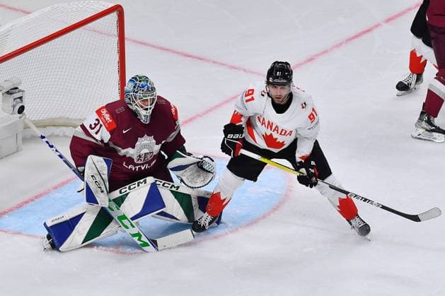 LATVIA, RIGA - 12.05.23: FANTILLI Adam, SILOVS Arturs. Game Latvia - Canada. IIHF 2023 Ice hockey, Eishockey World Championship, WM, Weltmeisterschaft  Copyright: xVITALIIxKLIUIEVx