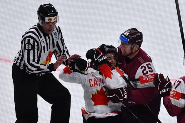 LATVIA, RIGA - 12.05.23: VELENO Joe, DZERINS Andris. Game Latvia - Canada. IIHF 2023 Ice hockey, Eishockey World Championship, WM, Weltmeisterschaft  Copyright: xVITALIIxKLIUIEVx