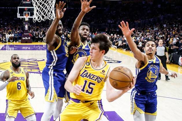 May 12, 2023, Los Angeles, California, USA: Los Angeles Lakers guard Austin Reaves (15) looks to pass while defended by Golden State Warriors forwards Draymond Green (23), Andrew Wiggins (22) and guard Jordan Poole (3) during an NBA, Basketball Herren, USA basketball Western Conference semifinal game 6 at Crypto.com Arena, Friday, May 12, 2023, in Los Angeles. Los Angeles USA - ZUMAc68_ 20230512_zaf_c68_031 Copyright: xRingoxChiux