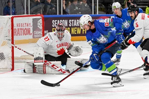 RIGA, LATVIA MAY 14 Ziga Jeglic of Slovenia tries to score against goalkeeper Devon Levi of Canada during the 2023 IIHF Ice Hockey World Championship Finland Latvia game between Slovenia and Canada at Arena Riga on May 14, 2023 in Riga, Latvia Riga Arena Riga Latvia  Copyright: xJustPictures.ch AndreaxBrancax