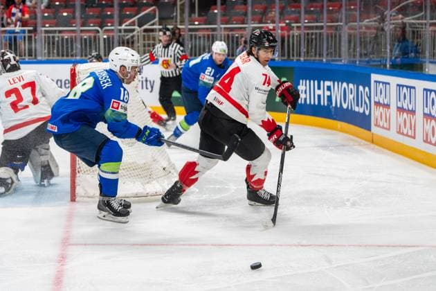RIGA, LATVIA MAY 14 Ethan Bear of Canada R against Ken Ograjensek of Slovenia L during the 2023 IIHF Ice Hockey World Championship Finland Latvia game between Slovenia and Canada at Arena Riga on May 14, 2023 in Riga, Latvia Riga Arena Riga Latvia  Copyright: xJustPictures.ch JarixPestelaccix