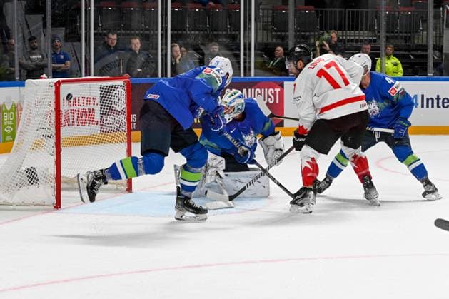 RIGA, LATVIA MAY 14 Milan Lucic of Canada scores a goal against goalkeeper Luka Gracnar of Slovenia during the 2023 IIHF Ice Hockey World Championship Finland Latvia game between Slovenia and Canada at Arena Riga on May 14, 2023 in Riga, Latvia Riga Arena Riga Latvia  Copyright: xJustPictures.ch AndreaxBrancax