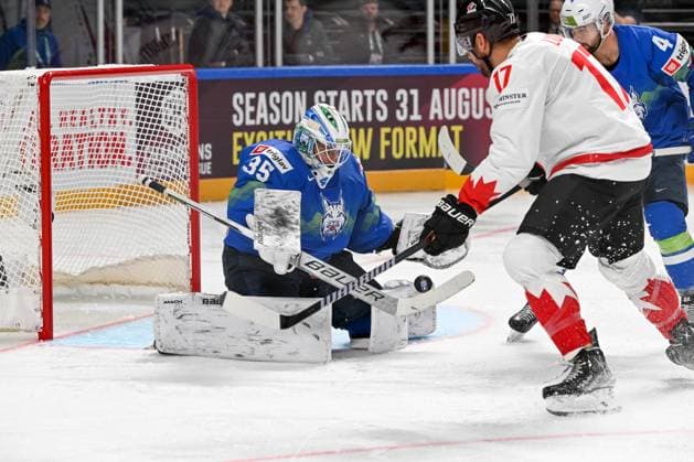 RIGA, LATVIA MAY 14 goalkeeper Luka Gracnar of Slovenia makes a save during the 2023 IIHF Ice Hockey World Championship Finland Latvia game between Slovenia and Canada at Arena Riga on May 14, 2023 in Riga, Latvia Riga Arena Riga Latvia  Copyright: xJustPictures.ch AndreaxBrancax